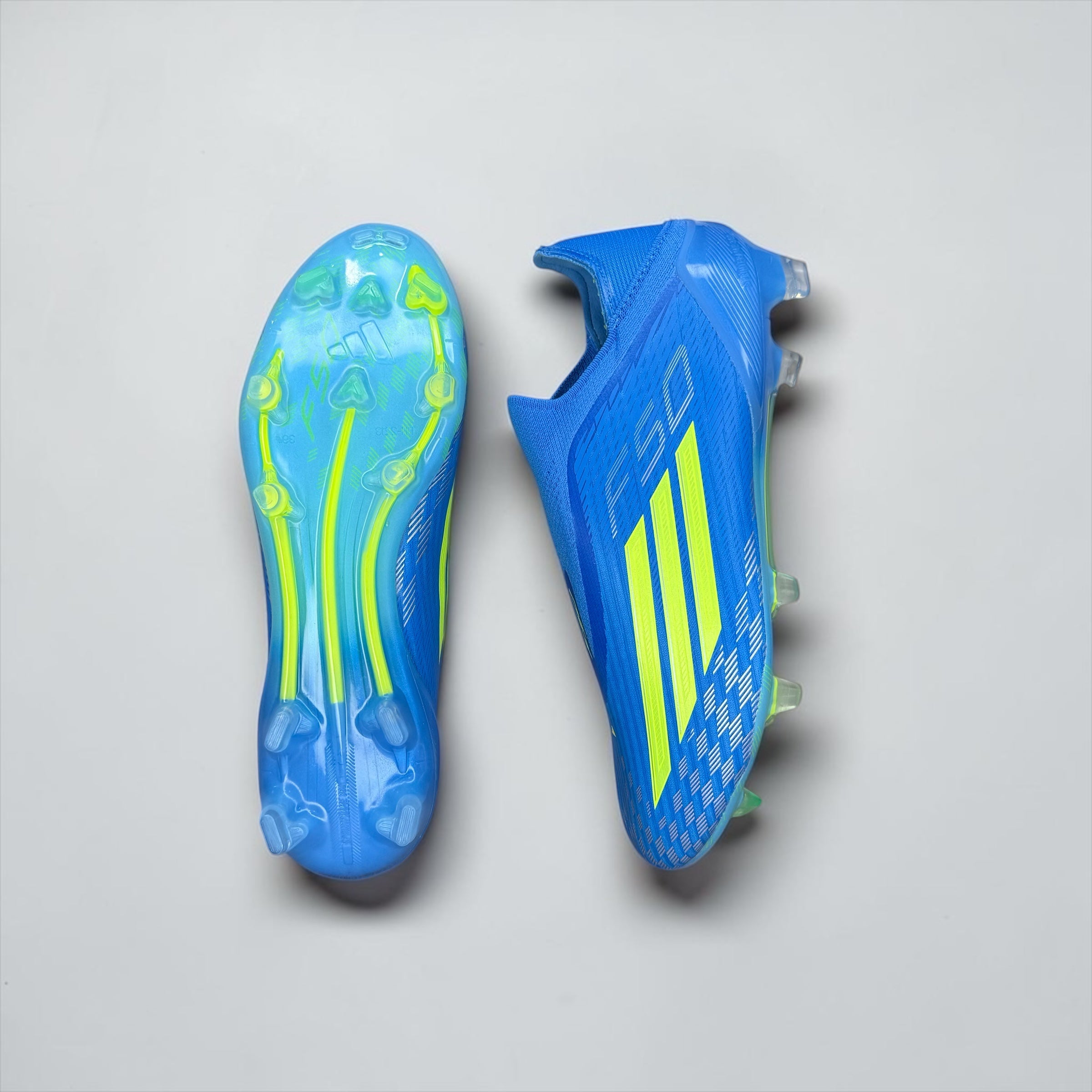 GUAYOS DE FÚTBOL ADIDAS F50 AZUL Y AMARILLO SIN CORDONES