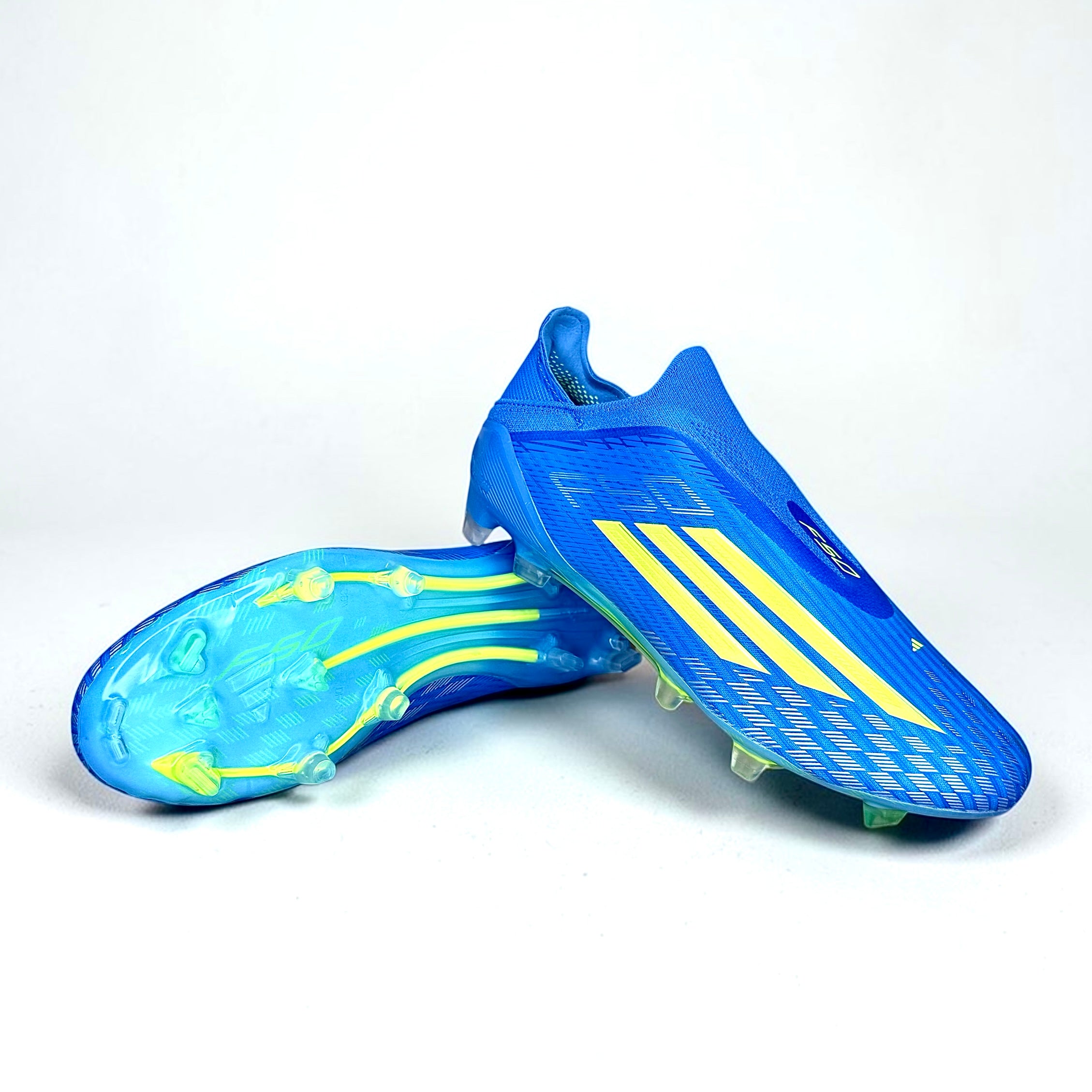 GUAYOS DE FÚTBOL ADIDAS F50 AZUL Y AMARILLO SIN CORDONES